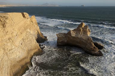 An arch stood till the 2007 earthquake, la cathedral, national reserve, Paracas, Peru.