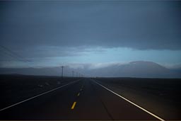 Tanaka at night and a huge mountain near the Pacific ocean in the desert. Peruvian southern coast.