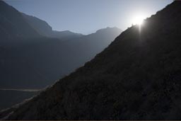 Sun, first rays of light over Colca Canyon walls as we ride up on mules.