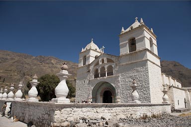 Stone church, white wash, Maca in Colca Valley, Peru.