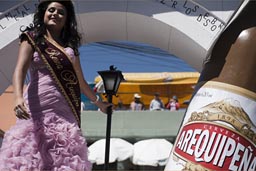 On Arequipena (beer) truck, the beauty and the beer. Arequipena Day, Peru.