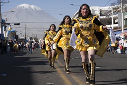 In back of Avenida de Independencia is Volcan Misti, parade on Arequipa Day.