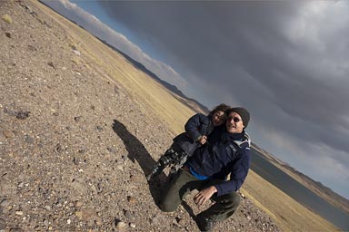 Daniel taking this shot, has troubles to hold camera straight, David and I on picture, David carries my old camera. Peru.