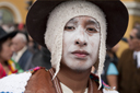 Hat and a white mask, men on Lima Independence Day in Peru. 