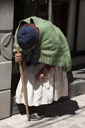Hunchbacked old woman in Puno, Peru. Hunchbacked old woman in Puno, Peru.