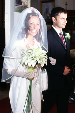 Bride and brother enter church