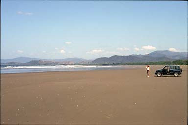 Irene and Suzuki on very wide and lonely Pacific beach