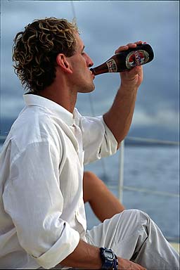 Schreib enjoys a bottle of Mauritian Phoenix brew