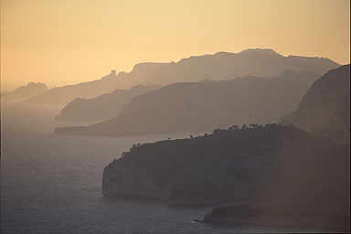 The Calanques of Cassis in a distance at dusk as viewed from the Cap Canaille